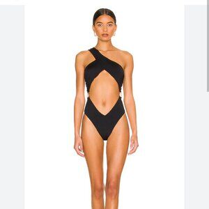 We wore what asymmetrical cross-over one piece